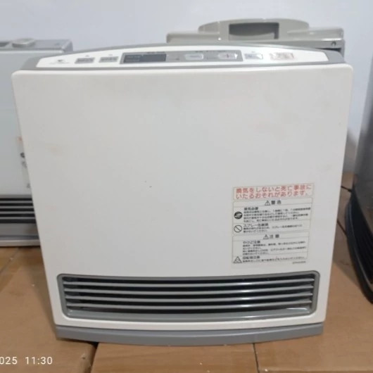 بخاری گازی ژاپنی 2500کالزی صفحه تخت .